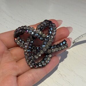 Elegant Black and Silver Crystal Knot Brooch